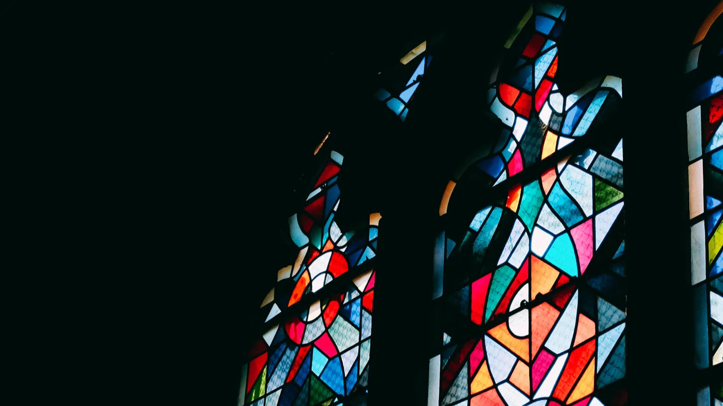 Stained glass window in a gothic church sanctuary